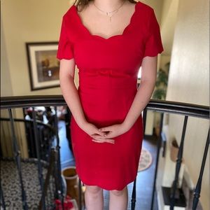 Red dress with scalloped details